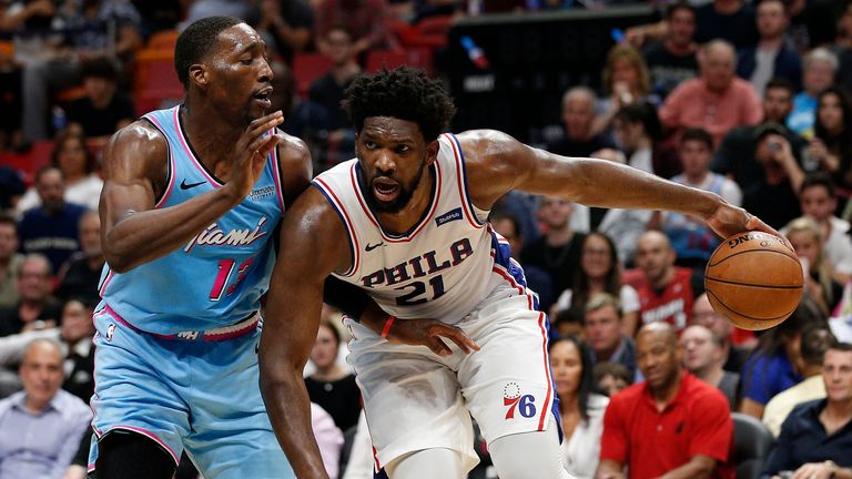 MIAMI, FLORIDA - DECEMBER 28: Joel Embiid #21 of the Philadelphia 76ers drives to the basket against Bam Adebayo #13 of the Miami Heat during the second half at American Airlines Arena on December 28, 2019 in Miami, Florida. NOTE TO USER: User expressly acknowledges and agrees that, by downloading and/or using this photograph, user is consenting to the terms and conditions of the Getty Images License Agreement. (Photo by Michael Reaves/Getty Images)
