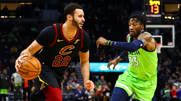MINNEAPOLIS, MN - DECEMBER 28: Larry Nance Jr. #22 of the Cleveland Cavaliers dribbles the ball past Robert Covington #33 of the Minnesota Timberwolves in the third quarter of the game at Target Center on December 28, 2019 in Minneapolis, Minnesota. The Cavaliers defeated the Timberwolves 94-88. NOTE TO USER: User expressly acknowledges and agrees that, by downloading and or using this Photograph, user is consenting to the terms and conditions of the Getty Images License Agreement. (Photo by Dav