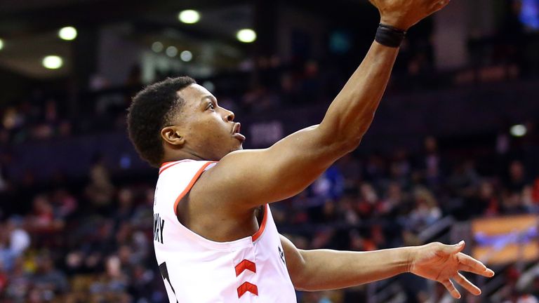 Kyle Lowry rises to score against the Mavericks