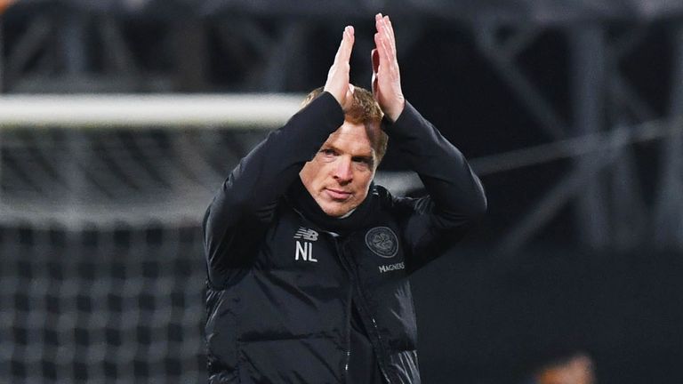 Neil Lennon applauds the 1,000 travelling Celtic fans at Cluj