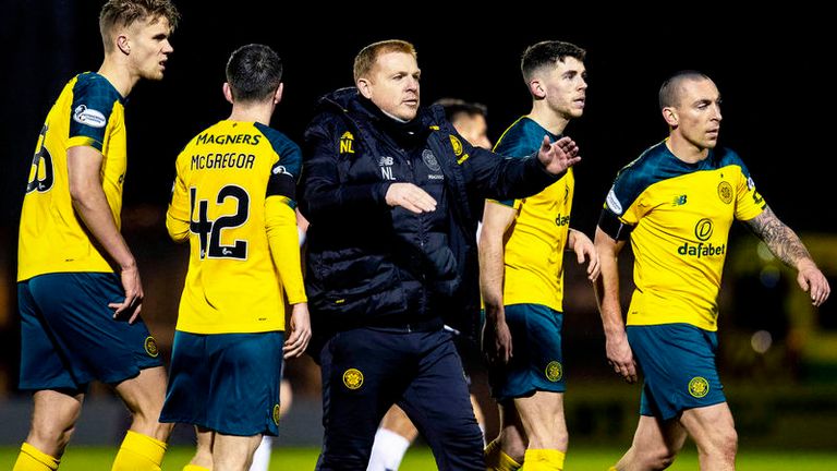 Neil Lennon celebrated with the away fans after Celtic kept up their winning run, which stretches back to October 6