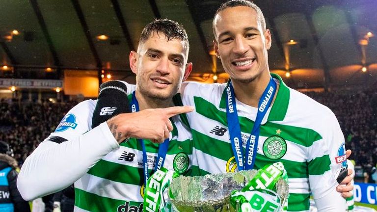 Bitton (left) celebrates winning the Scottish League Cup title with Christopher Jullien