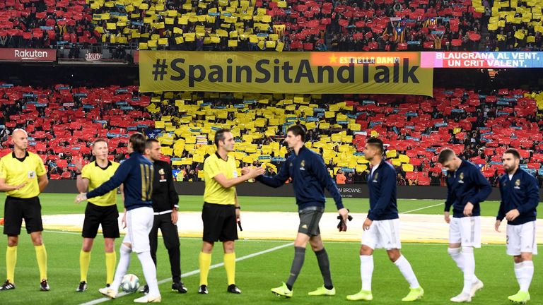 The 'Spain, sit and talk' message was on display inside the Nou Camp as well