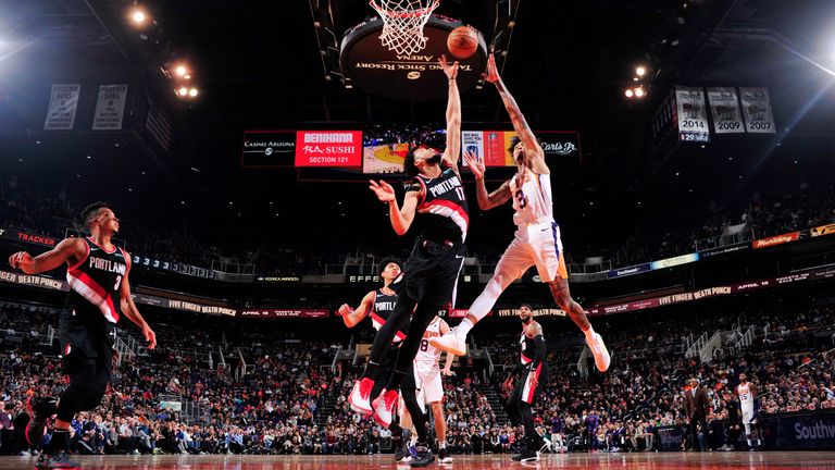 Kelly Oubre Jr. of the Phoenix Suns shoots the ball against the Portland Trail Blazers