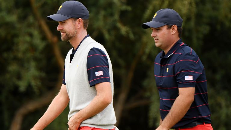 Webb Simpson of the United States team and Patrick Reed of the United States team walk during Saturday four-ball matches on day three of the 2019 Presidents Cup at Royal Melbourne Golf Course