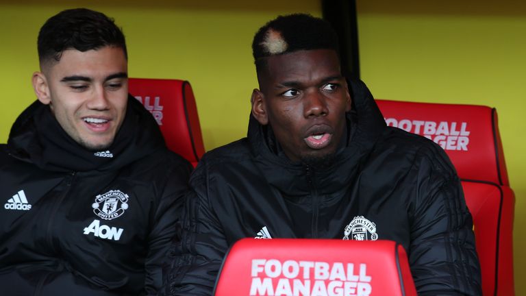 WATFORD, ENGLAND - DECEMBER 22: Paul Pogba of Manchester United watches from the bench ahead of the Premier League match between Watford FC and Manchester United at Vicarage Road on December 22, 2019 in Watford, United Kingdom. (Photo by Matthew Peters/Manchester United via Getty Images)