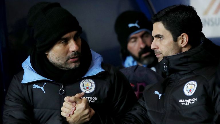 Pep Guardiola manager of Manchester City with Mikel Arteta assistant coach of Manchester City during the Carabao Cup Quarter Final match between Oxford United and Manchester City at Kassam Stadium on December 18, 2019 in Oxford, England. 