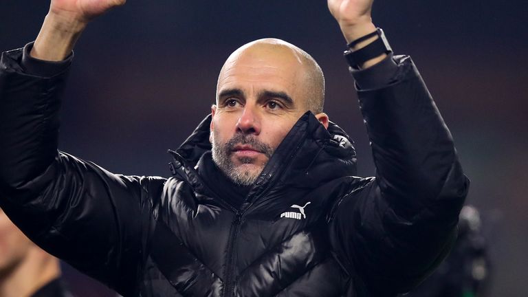 Pep Guardiola celebrates Manchester City's 4-1 win at Burnley on Tuesday