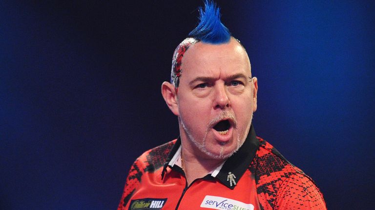 Peter Wright of Scotland celebrates after winning the first set in his Quarter-Final match against Luke Humphries of England during Day Fourteen of the 2020 William Hill World Darts Championship at Alexandra Palace on December 29, 2019 in London, England