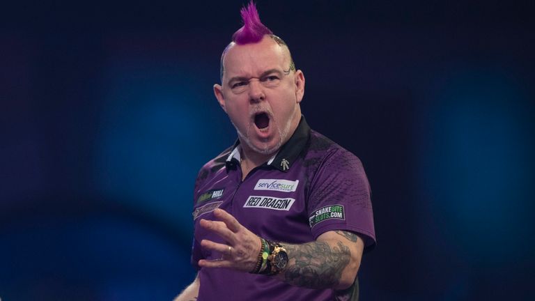 WILLIAM HILL PDC WORLD CHAMPIONSHIP  2020.ALEXANDRA PALACE.LONDON.PIC;LAWRENCE LUSTIG.ROUND 4.PETER WRIGHT V JEFFREY DE ZWAAN.PETER WRIGHT IN ACTION