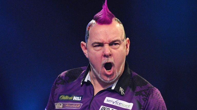 Peter Wright of Scotland celebrates in his Fourth Round match against Jeffrey de Zwaan of The Netherlands during Day Thirteen of the 2020 William Hill World Darts Championship at Alexandra Palace on December 28, 2019 in London, England.