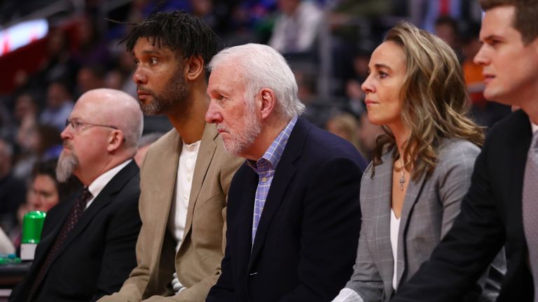  Head coach Gregg Popovich of the San Antonio Spurs looks on next to assistant coaches Becky Hammon and Tim Duncan