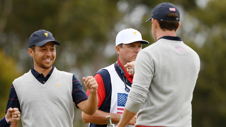 Xander Schauffele of the United States team and Patrick Cantlay of the United States team celebrate on the sixth green during Saturday afternoon foursomes matches on day three of the 2019 Presidents Cup at Royal Melbourne Golf Course