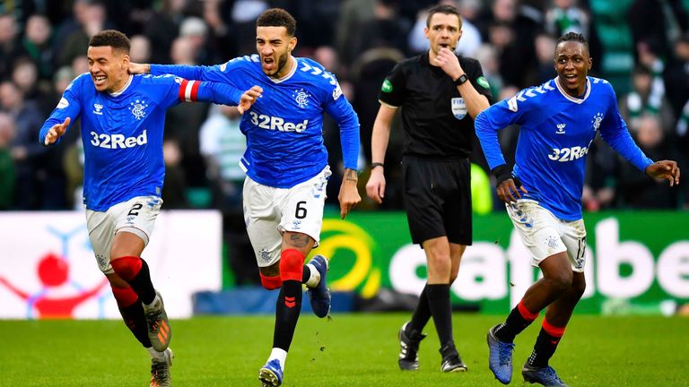 Rangers players celebrate victory against Celtic