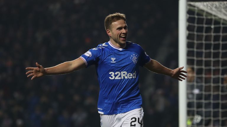 Greg Stewart scored twice in the closing stages as Rangers smashed Hearts