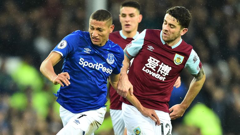 Richarlison battles for the ball with Robbie Brady