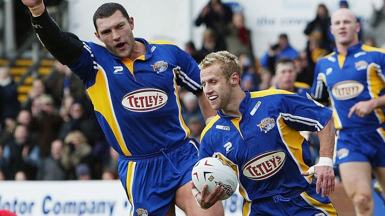 LEEDS, ENGLAND - FEBRUARY 22: Rob Burrow of Leeds scores a try during the Tetleys Super League game between Leeds Rhinos and London Broncos at Headingley on February 22, 2004 in Leeds, England.  (Photo by Laurence Griffiths/Getty Images) *** Local Caption *** Rob Burrow