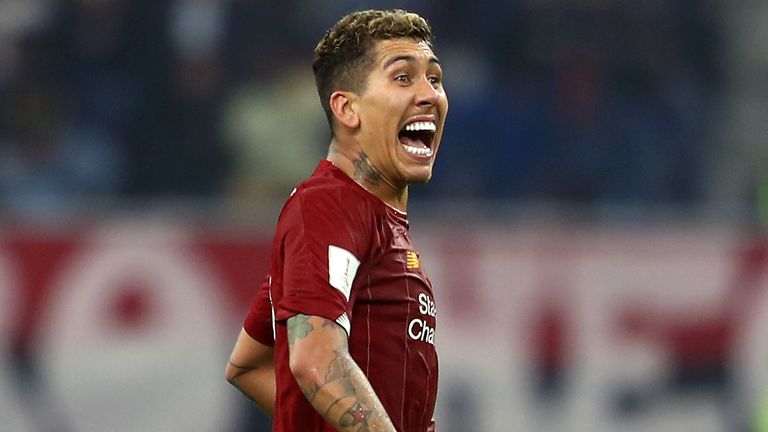 Roberto Firmino celebrates after scoring for Liverpool against Flamengo