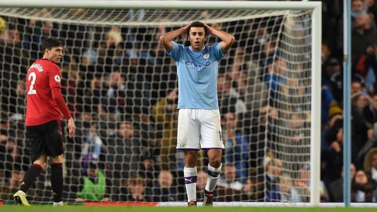 Manchester City's Spanish midfielder Rodri (C) reacts after his shot was tipped over the bar during the English Premier League football match between Manchester City and Manchester United at the Etihad Stadium in Manchester, north west England, on December 7, 2019. 