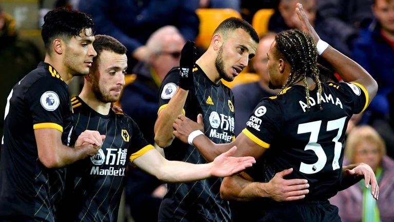 Romain Saiss celebrates his equaliser at Carrow Road