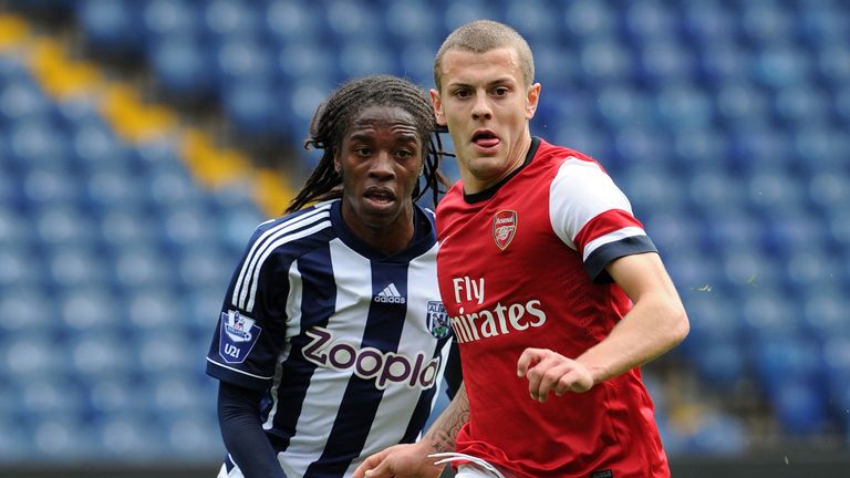 Jack Wilshere of Arsenal holds off Romaine Sawyers of West Brom during the Barclays Under-21 League match between West Bromwich Albion U21 and Arsenal U21 at Hawthorns Stadium on October 01, 2012 in West Bromwich, England.