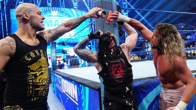 Roman Reigns finished SmackDown being showered with dog food by Baron Corbin and Dolph Ziggler