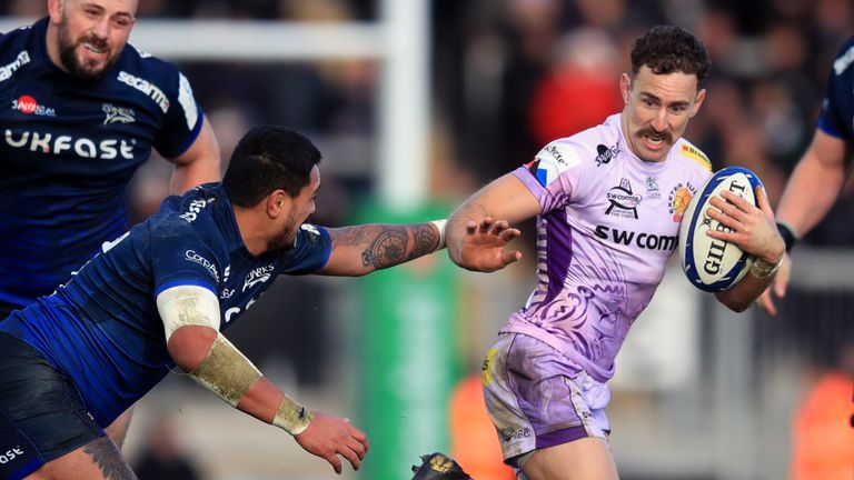 Nic White evades the tackle of Sale's Denny Solomona