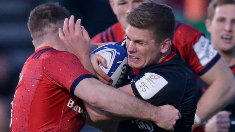 Owen Farrell is tackled by opposite number JJ Hanrahan