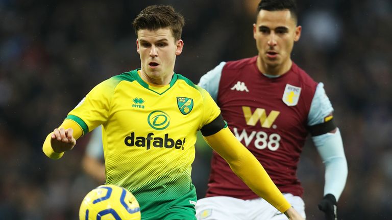 Sam Byram controls the ball under pressure from Anwar El Ghazi