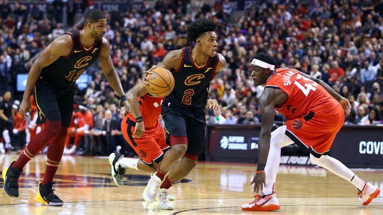 Collin Sexton of the Cleveland Cavaliers dribbles the ball as Pascal Siakam of the Toronto Raptors