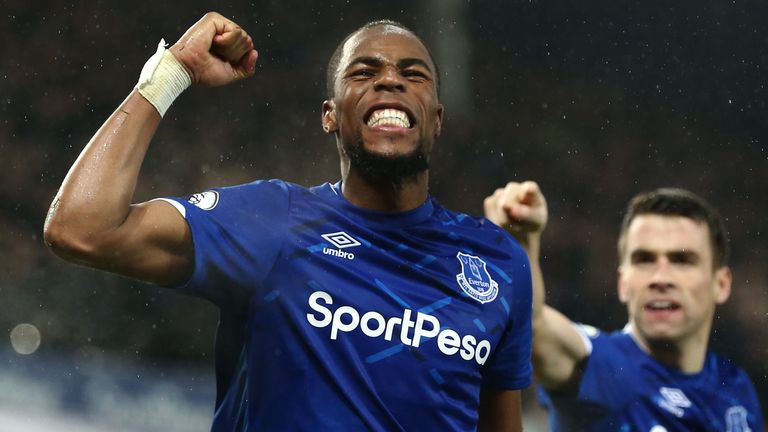 Seamus Coleman and Djibril Sidibe celebrate the Dominic Calvert-Lewin (not in frame) of Everton goal during the Premier League match between Everton FC and Burnley FC at Goodison Park