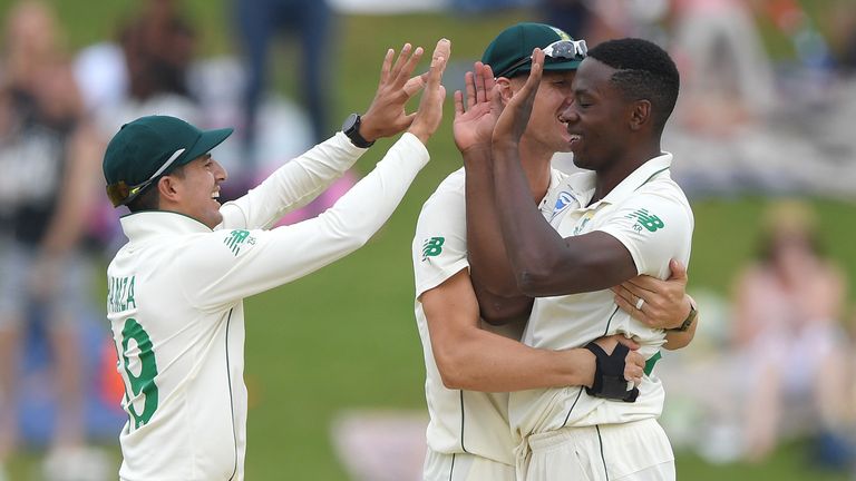 South Africa bowler Kagiso Rabada is congratulated after taking the final wicket of Stuart Broad to win the match for South Africa during Day Four of the First Test match between England and South Africa at SuperSport Park on December 29, 2019 in Pretoria, South Africa.