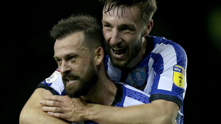 Steven Fletcher celebrates with Morgan Fox after the Sky Bet Championship match between Sheffield Wednesday and Brentford