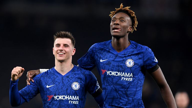 Mason Mount and Tammy Abraham celebrates with the away fans at the final whistle