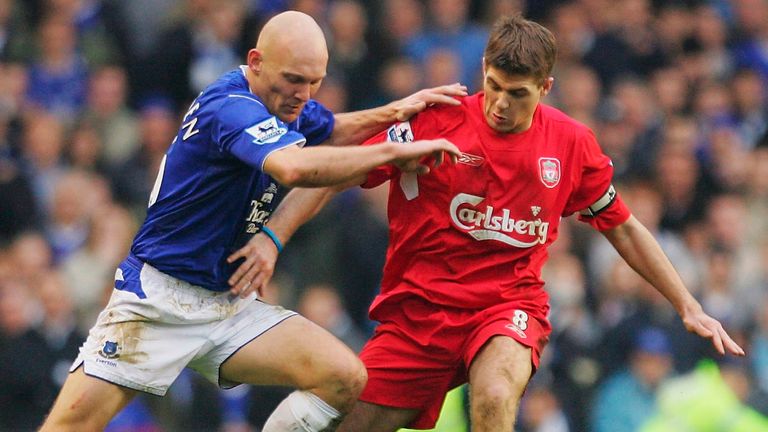 LIVERPOOL, ENGLAND - DECEMBER 11: Lee Carsley of Everton battles with Steven Gerrard of Liverpool during the FA Barclays Premiership match between Everton and Liverpool at Goodison Park on December 11, 2004 in Liverpool, England.  (Photo by Laurence Griffiths/Getty Images)