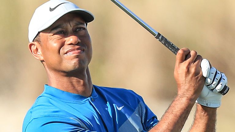 Tiger Woods roared into contention