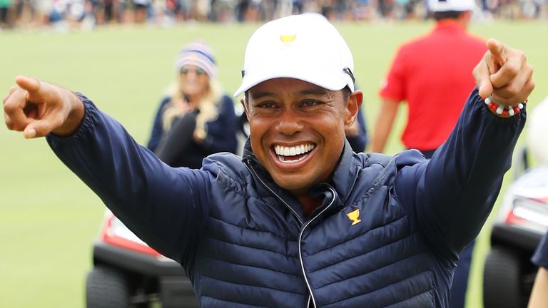 Captain Tiger Woods celebrates Team USA's victory in the Presidents Cup