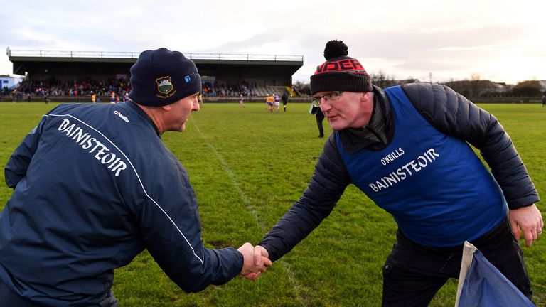 Liam Sheedy and Brian Lohan shake hands after the match