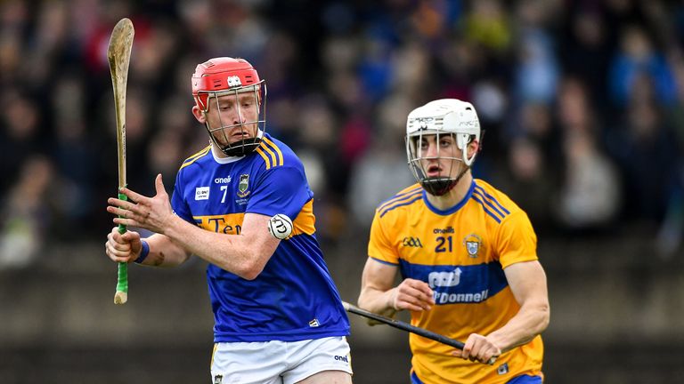 Robert Byrne of Tipperary in action against Aidan McCarthy of Clare