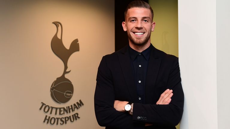Toby Alderweireld poses after signing a new contract with Spurs