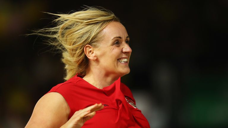 Tracey Neville joining her players on court after winning the final of the 2018 Commonwealth Games