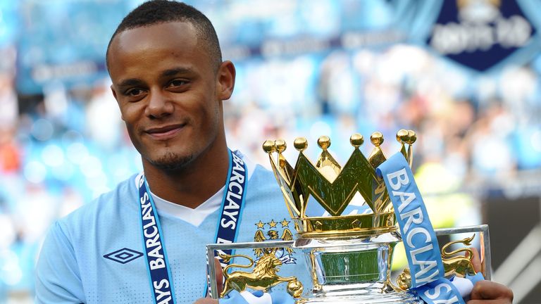 Vincent Kompany celebrates winning the Premier League in 2012