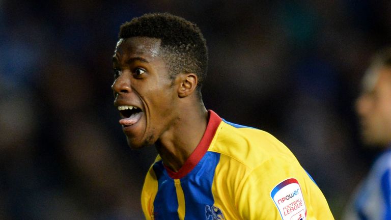 BRIGHTON, ENGLAND - MAY 13:  Wilfried Zaha of Crystal Palace celebrates his second goal during the npower Championship play off semi final second leg between Brighton & Hove Albion and Crystal Palace at Amex Stadium on May 13, 2013 in Brighton, England.  (Photo by Shaun Botterill/Getty Images)