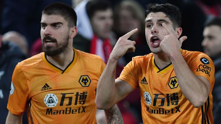 Wolves protest during Premier League game against Liverpool