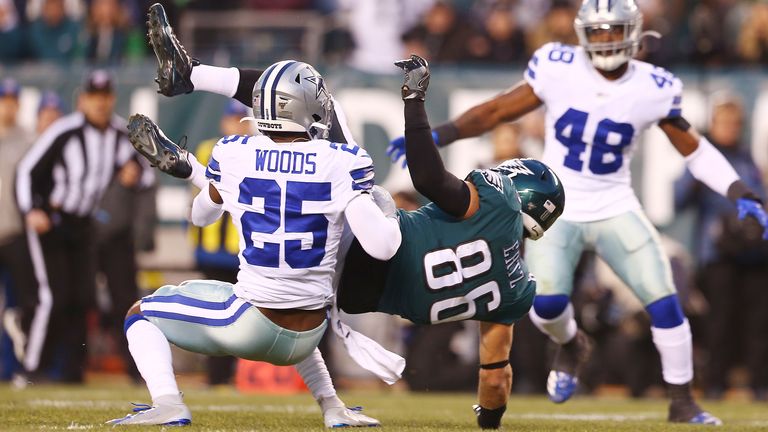 Philadelphia 76ers tight end Zach Ertz was injured in a collision with Dallas Cowboys safety Xavier Woods