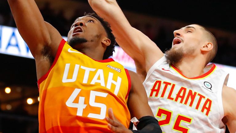 Donovan Mitchell scores on a lay-up against Atlanta