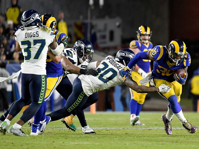 SEAHAWKS: Seattle fends off Minnesota 37-30 to claim first in NFC