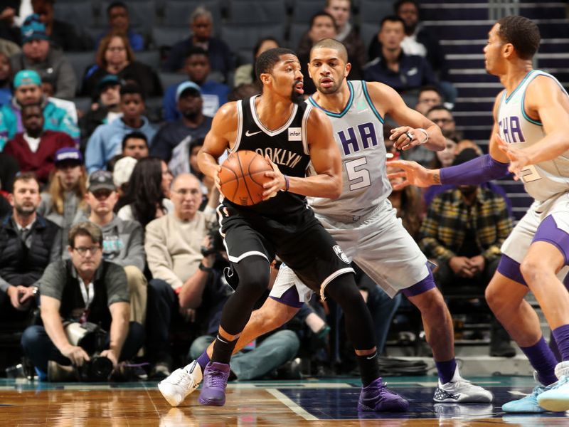 Brooklyn Nets' Jarrett Allen, left, celebrates a basket with teammate Joe  Harris during the first half of an NBA basketball game against the San  Antonio Spurs, Thursday, Dec. 19, 2019, in San