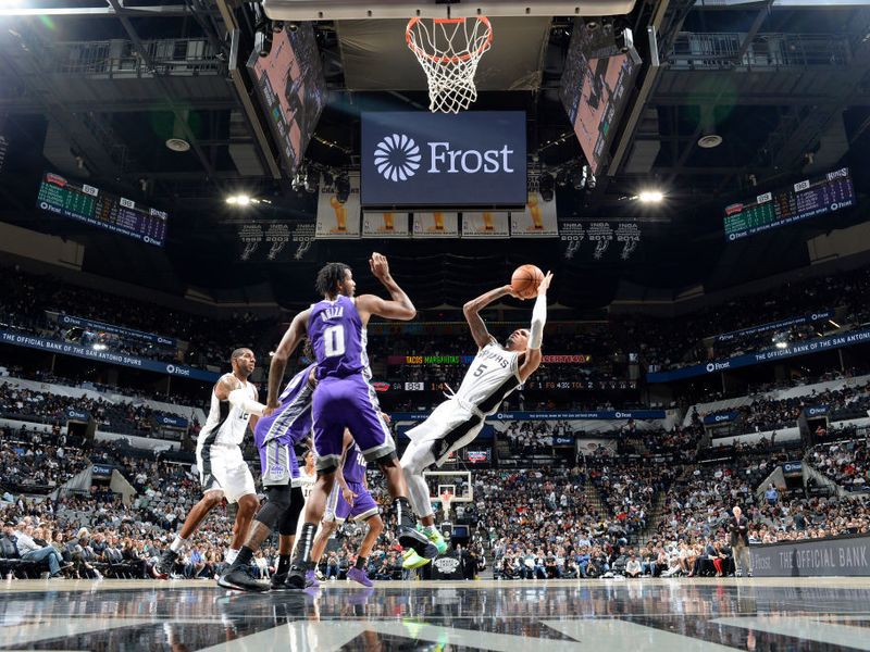 Brooklyn Nets' Jarrett Allen, left, celebrates a basket with teammate Joe  Harris during the first half of an NBA basketball game against the San  Antonio Spurs, Thursday, Dec. 19, 2019, in San