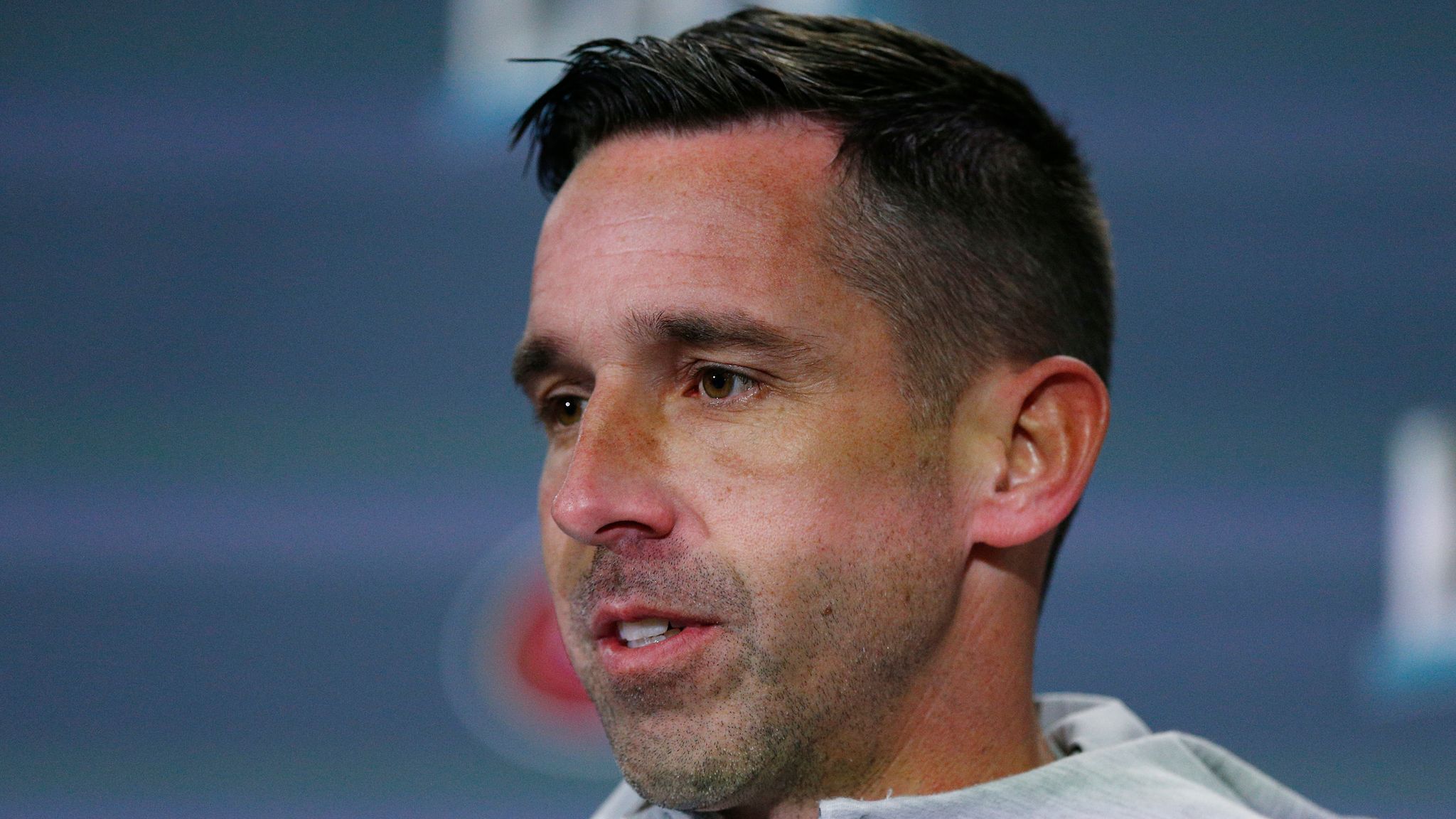 How is San Francisco 49ers head coach Kyle Shanahan related to